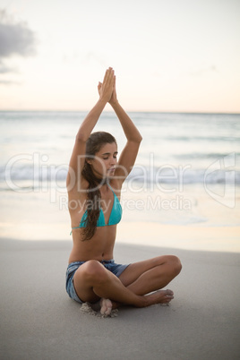 Young woman performing yoga