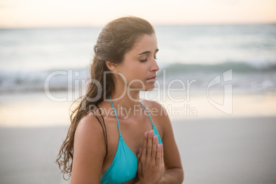 Young woman performing yoga