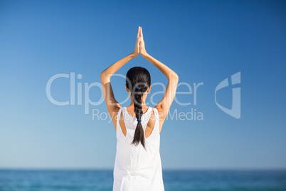 Young woman performing yoga