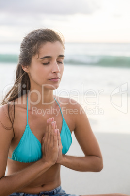 Young woman performing yoga