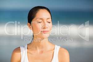 Beautiful young woman meditating