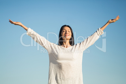 Woman stretching out her arms