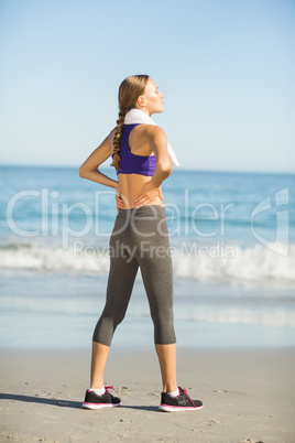 Beautiful woman taking break after exercising