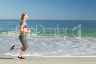 Woman listening music while exercising