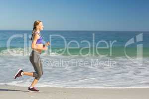 Woman listening music while exercising