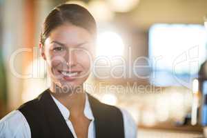 Portrait of smiling waitress