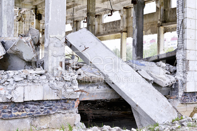 Pieces of Metal and Stone are Crumbling from Demolished Building Floors