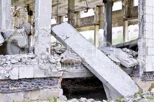 Pieces of Metal and Stone are Crumbling from Demolished Building Floors