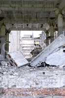 Pieces of Metal and Stone are Crumbling from Demolished Building Floors