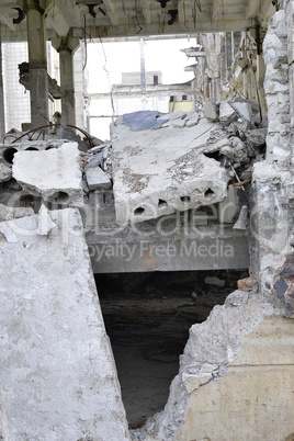 Pieces of Metal and Stone are Crumbling from Demolished Building Floors