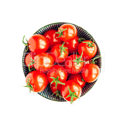 Bowl of tomatoes on white background
