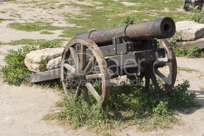 Ancient cannon on wheels photo