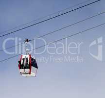 Gondola lift with ski and snowboards
