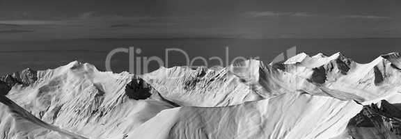 Black and white panoramic view on off-piste slope
