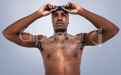 Composite image of swimmer ready to dive