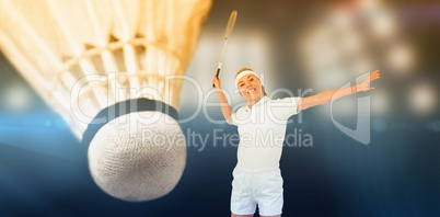 Composite image of badminton player playing badminton