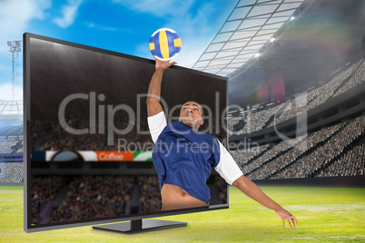 Composite image of sportsman posing while playing volleyball