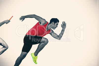 Composite image of confident male athlete running from starting