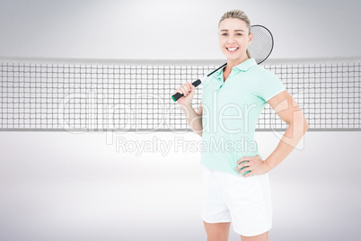 Composite image of badminton player posing and smiling