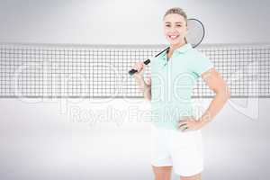 Composite image of badminton player posing and smiling