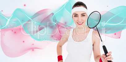 Composite image of badminton player is posing and smiling