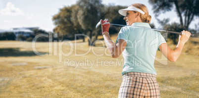 Composite image of woman playing golf