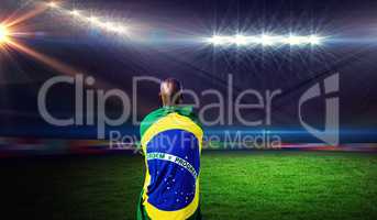 Composite image of rear view of brazilian sportsman