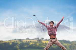 Man jumping with golf club