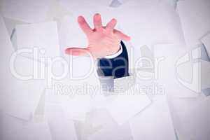 Composite image of mid section of a businessman with hands on a