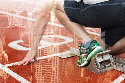 Composite image of mid section of a man ready to race on running