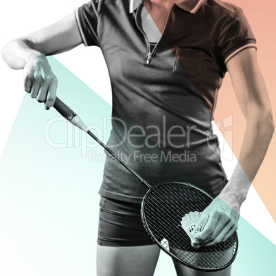 Composite image of badminton player holding a racquet ready to s