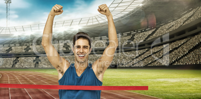 Composite image of portrait of cheerful winner athlete crossing