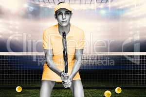 Composite image of female athlete waiting a tennis ball