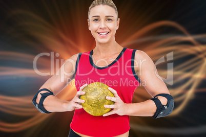 Composite image of female athlete with elbow pad holding handbal