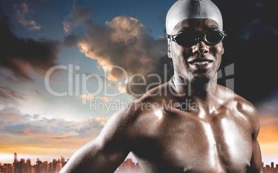 Composite image of swimmer standing with hand on hip