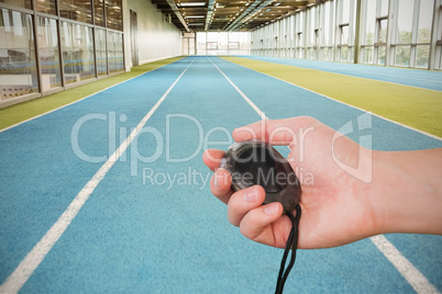 Close up of a hand holding a timer