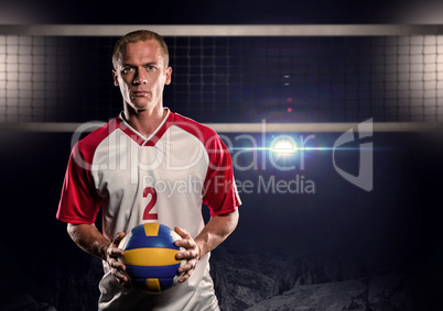 Composite image of sportsman holding a volleyball