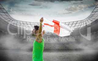 Composite image of profile view of sportsman holding an england