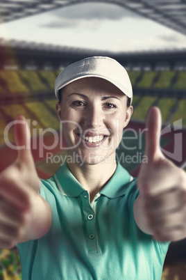 Composite image of sportswoman posing on black background Composite image of sportswoman posing on black background