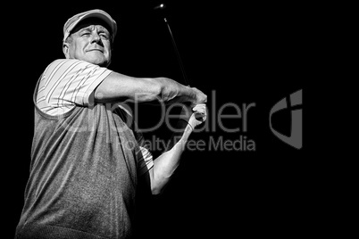 Composite image of view of a man playing golf