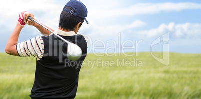 Composite image of man playing golf