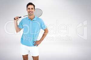 Composite image of badminton player standing with hand on hip