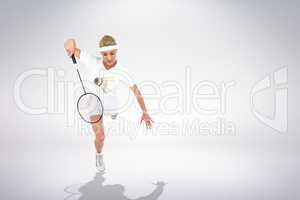 Composite image of badminton player playing badminton