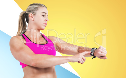 Composite image of female athlete using her smart watch