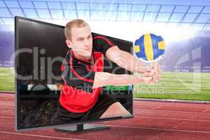 Composite image of sportsman posing while playing volleyball