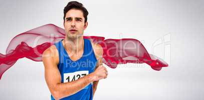 Composite image of male athlete running on white background