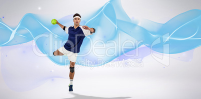 Composite image of portrait of sportsman throwing a ball