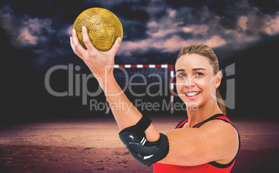 Composite image of female athlete with elbow pad holding handbal