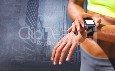 Composite image of close up on a sportswoman wearing a connected