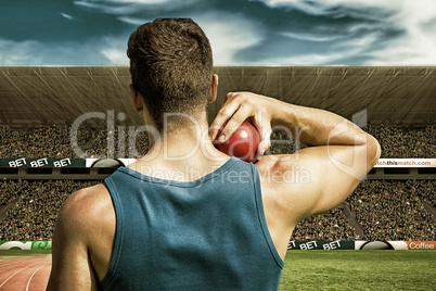 Composite image of rear view of sportsman practising shot put